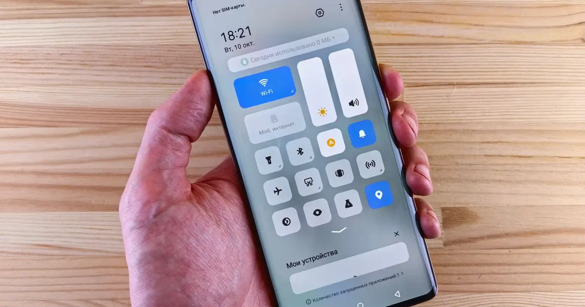 Hand holding an Android phone with network controls open